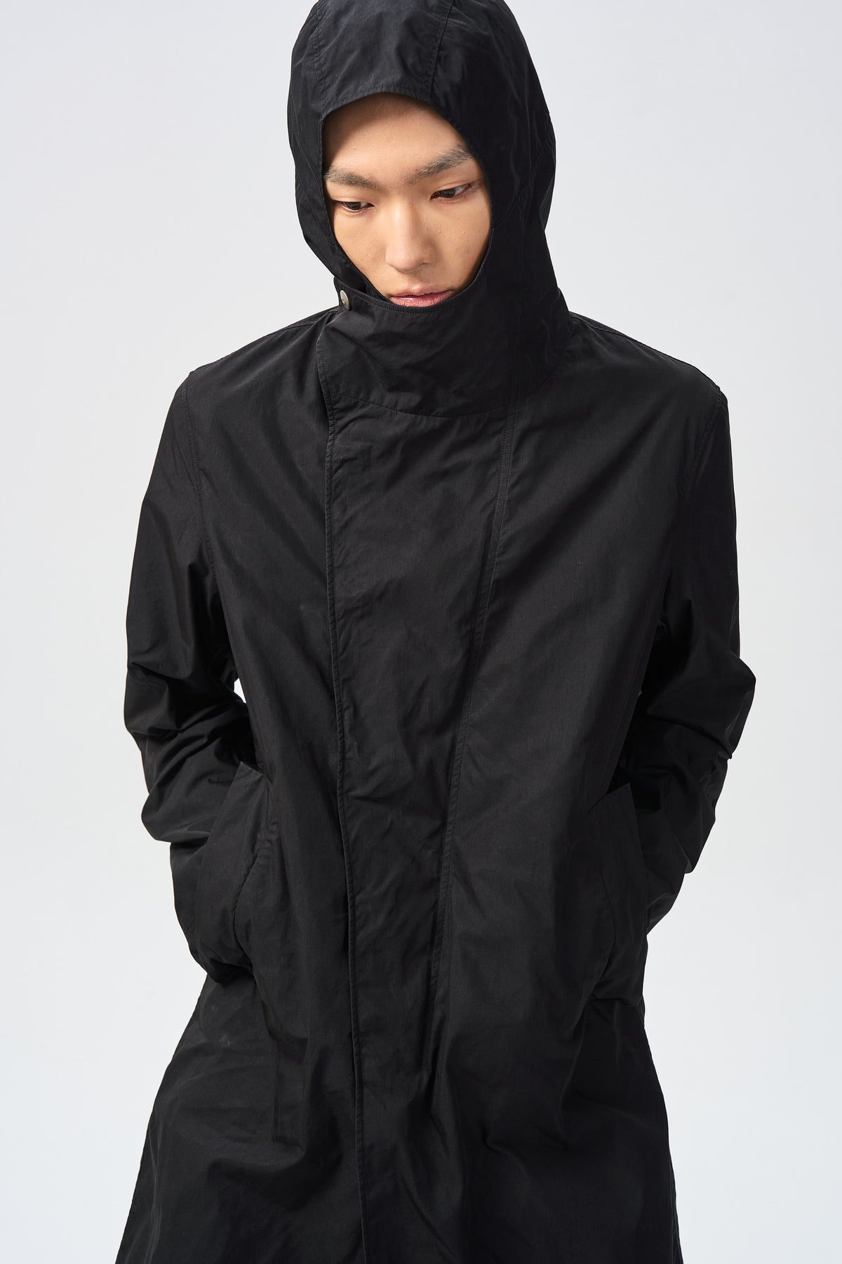LORN OVER-SHELL COAT — front closure and shell detail — ATTEMPT AW26