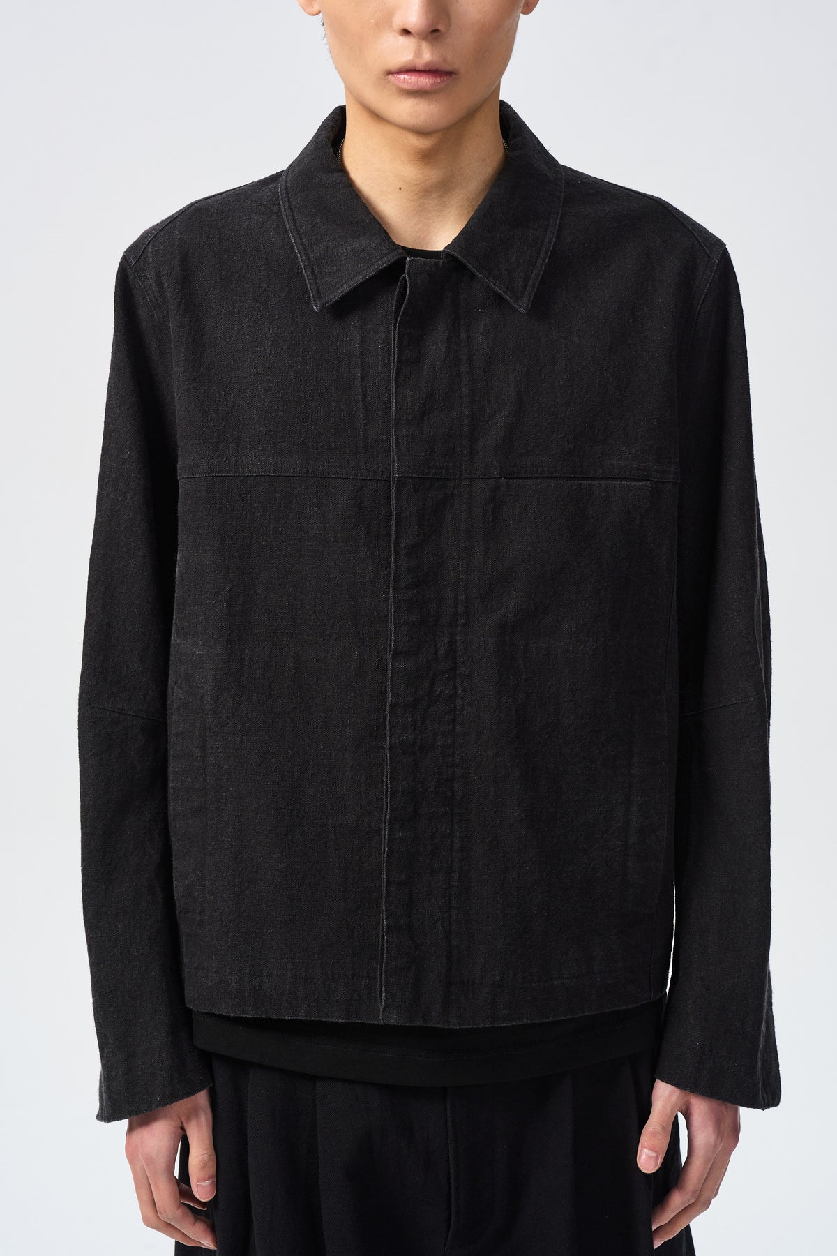 VALL AXIS JACKET — collar yoke and concealed placket detail — ATTEMPT AW26