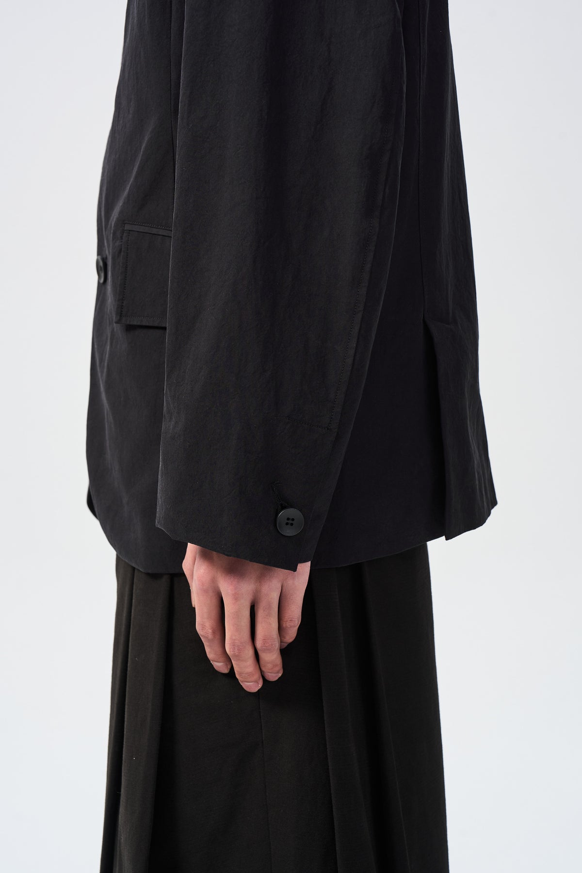 ARC BLAZER — cuff buttons and side hem detail — ATTEMPT AW26