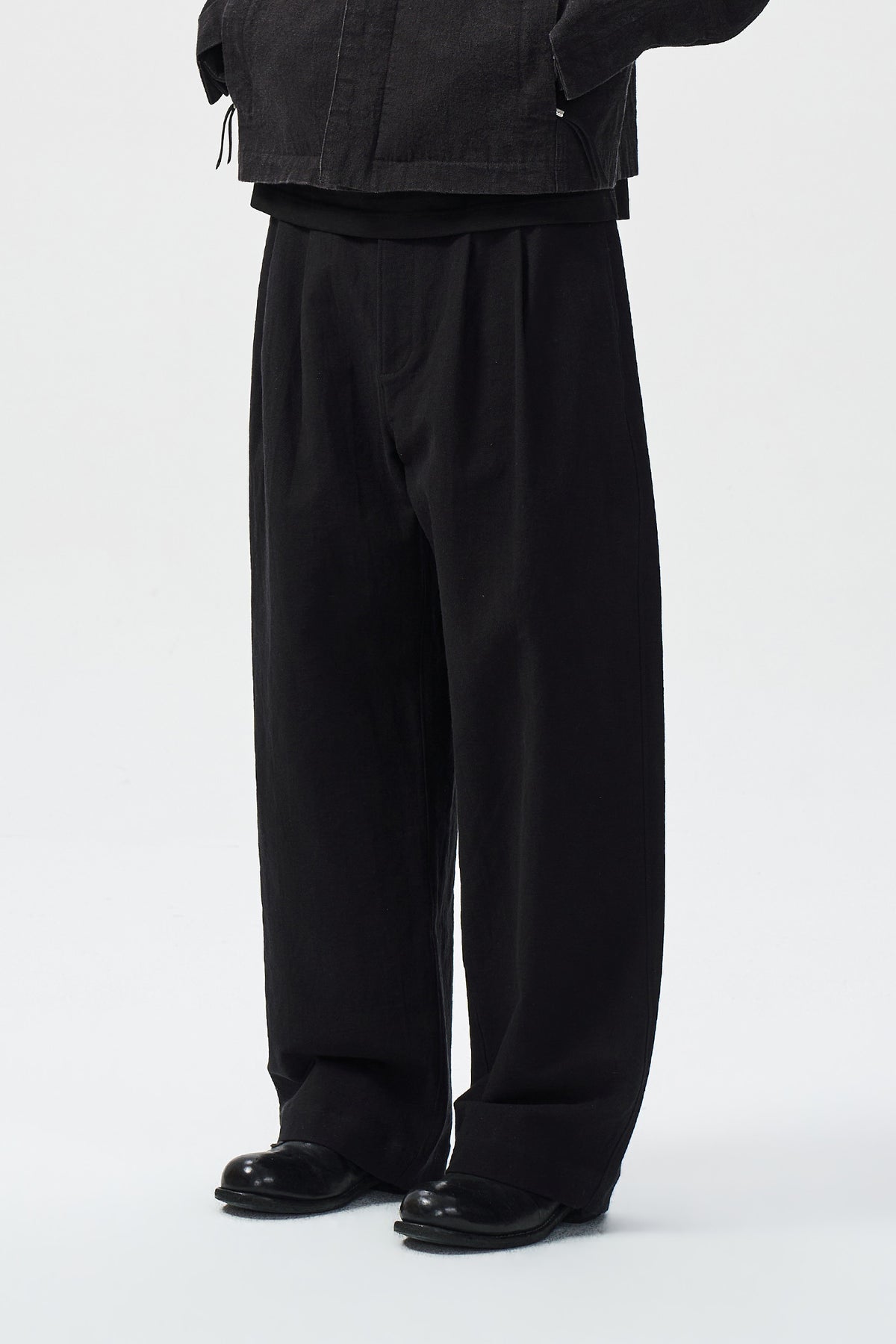 ORNE PLEAT TROUSERS — front pleats and leg shape view — ATTEMPT AW26