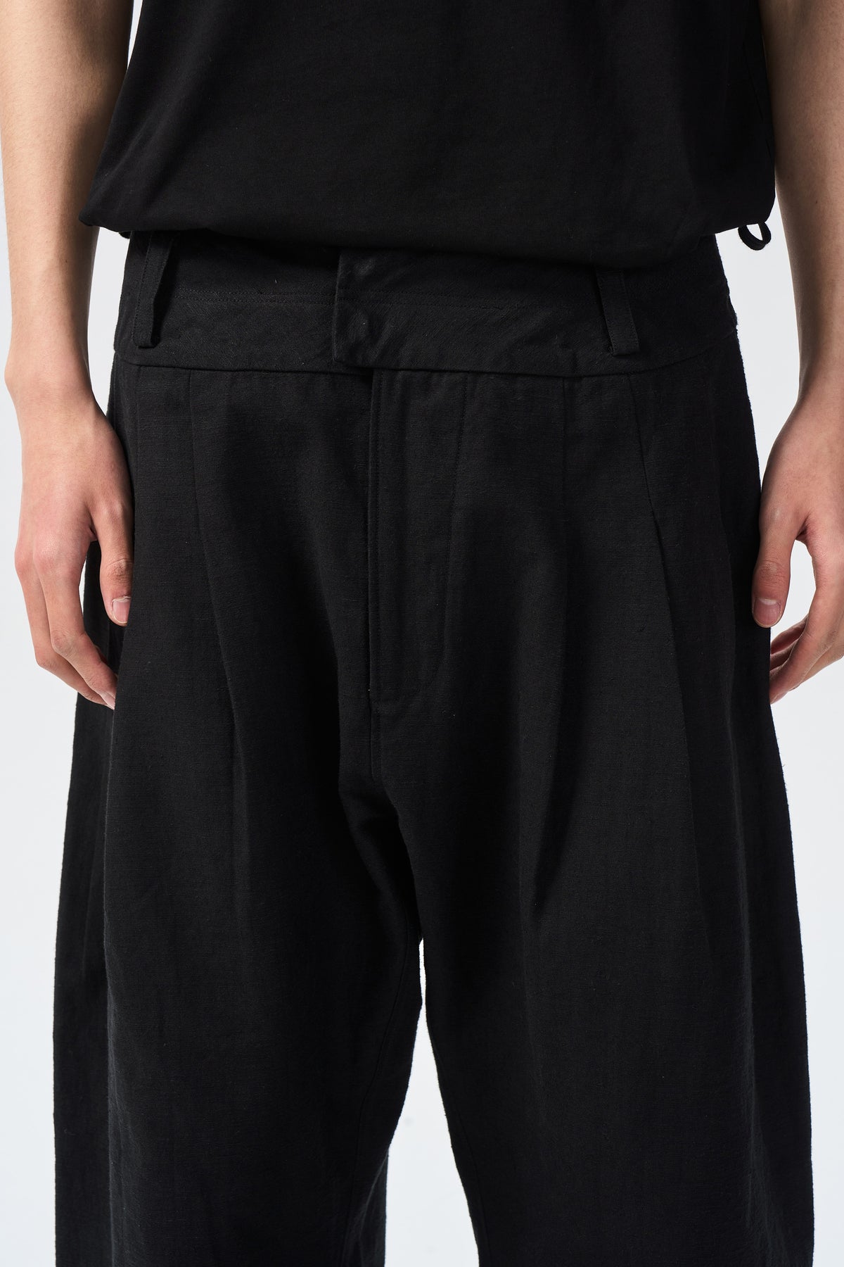 HORSESHOE TROUSERS — front waistband and closure detail — ATTEMPT AW26
