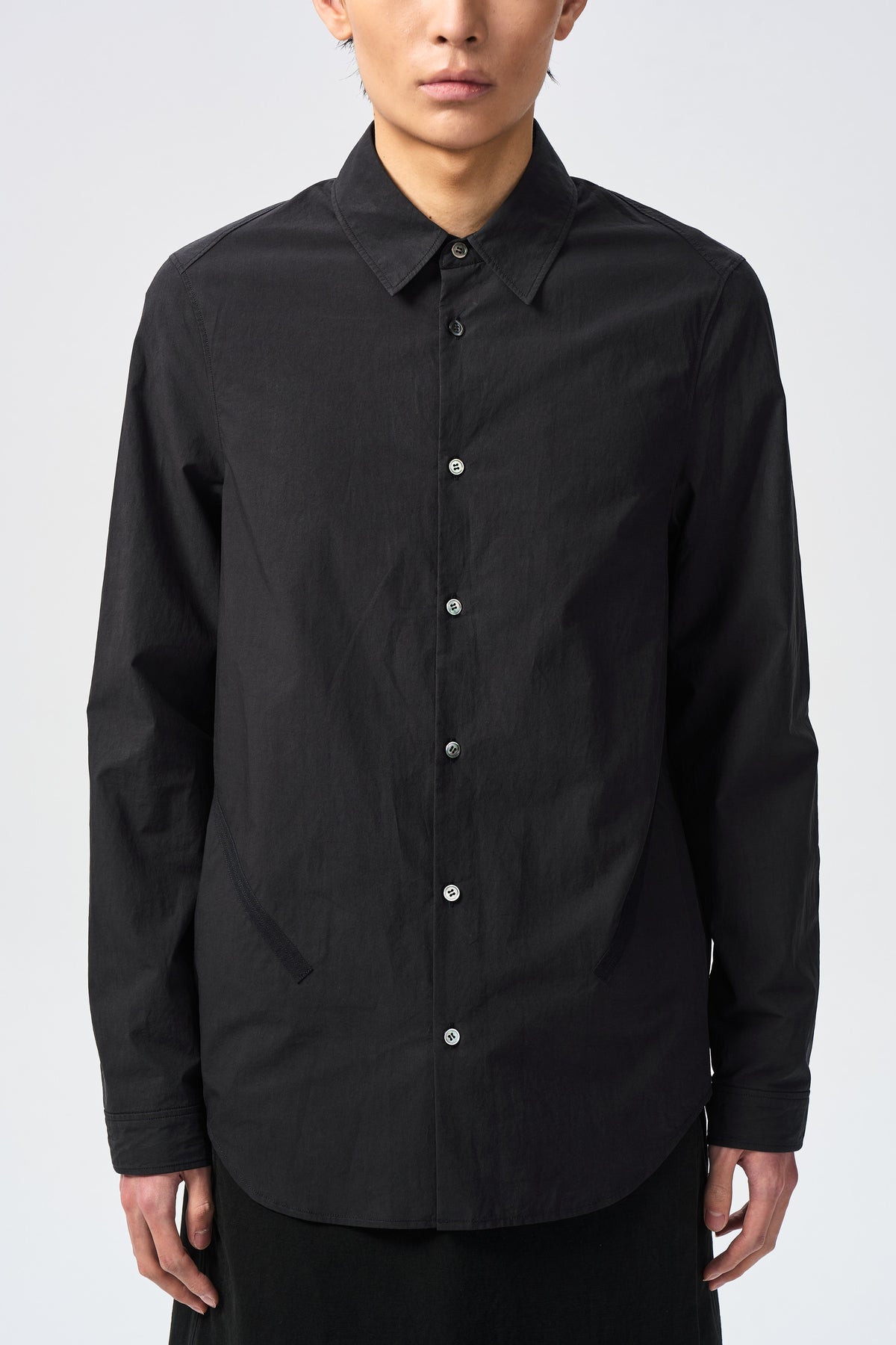AVEL BOUND SHIRT — collar button placket and hem detail — ATTEMPT AW26